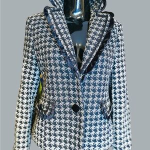 Women's Black and White Houndstooth Jacket with Ruffles.